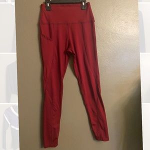 Woman’s red lulu wanna be leggings.